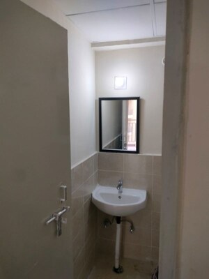 Bathroom in 2 BHK Apartment at Conscient Habitat 102, Sector 102 – for Rent