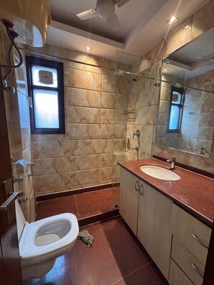 Bathroom in 3 BHK Builder Floor at Greater Kailash I – for Rent