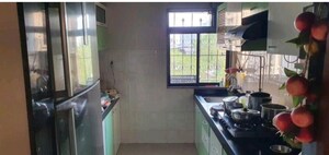 Kitchen in 2 BHK Apartment at Gala Pride Park, Manpada – for Rent