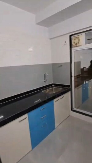 Kitchen in 1 BHK Apartment at Arihant Aarohi, Padle – for Rent