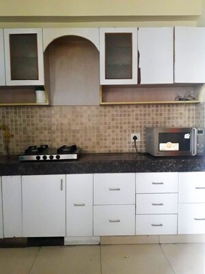 Kitchen in 2.5 BHK Apartment at Panchsheel Wellington, Dundahera – for Sale