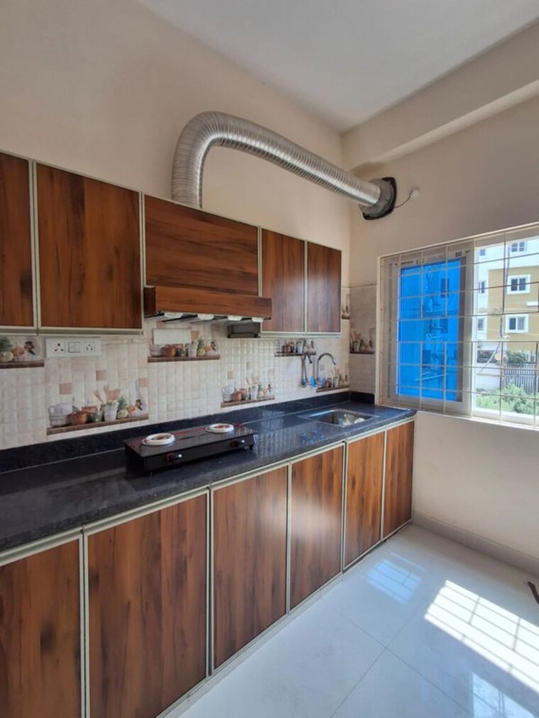 Kitchen, rr-tropicana 2 Bedroom 1220 Sq.Ft. Apartment In Narsingi Hyderabad 10709735