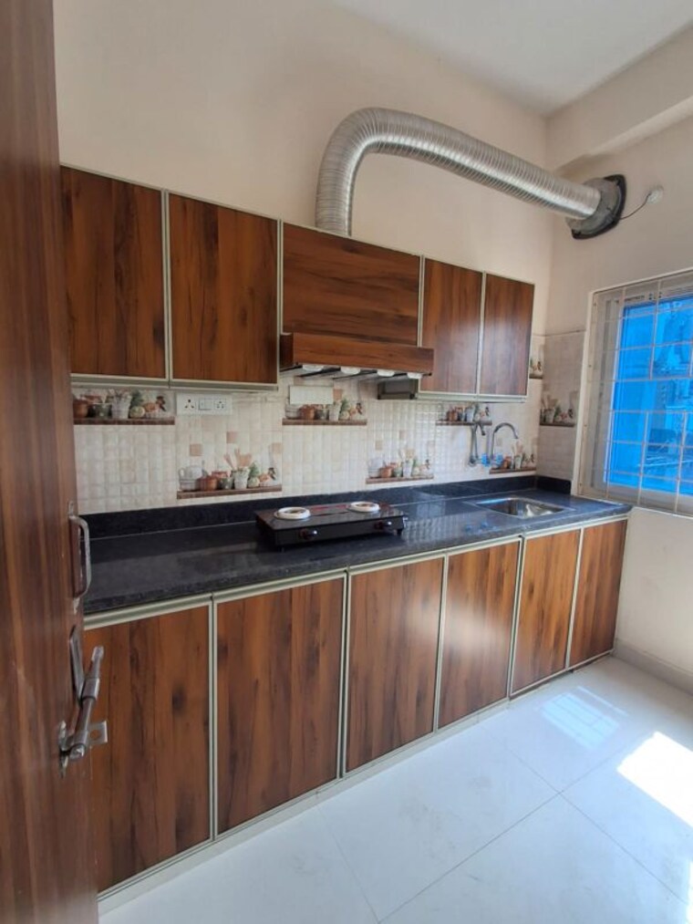Kitchen, rr-tropicana 2 Bedroom 1220 Sq.Ft. Apartment In Narsingi Hyderabad 10709735