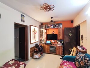 Living Room in 1 BHK Apartment at Vaibhav Wisteria Residency, Santacruz East – for Sale