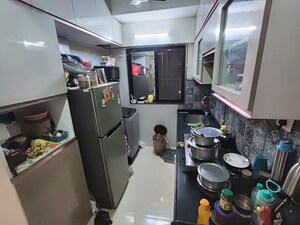 Team Area in 1 BHK Apartment at Vaibhav Wisteria Residency, Santacruz East – for Sale