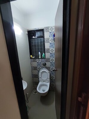 Bathroom in 1 BHK Apartment at Vaibhav Wisteria Residency, Santacruz East – for Sale