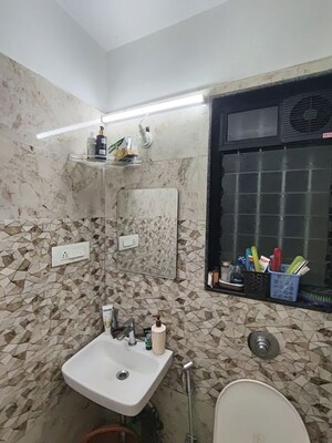 Bathroom in 1 BHK Apartment at Vaibhav Wisteria Residency, Santacruz East – for Sale
