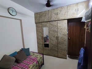 Bedroom in 1 BHK Apartment at Vaibhav Wisteria Residency, Santacruz East – for Sale