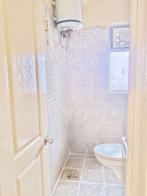 Bathroom in 2 BHK Apartment at Paras Tierea, Sector 137 – for Rent