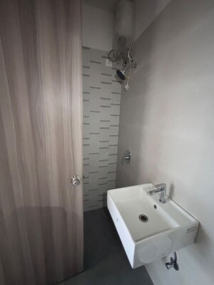 Bathroom in 1 BHK Apartment at Ashar Arize, Kalwa – for Sale
