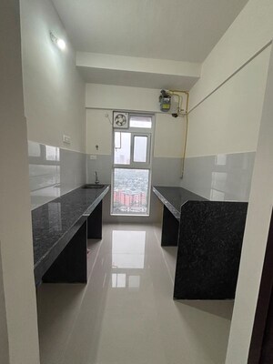 Kitchen in 1 BHK Apartment at Ashar Arize, Kalwa – for Sale