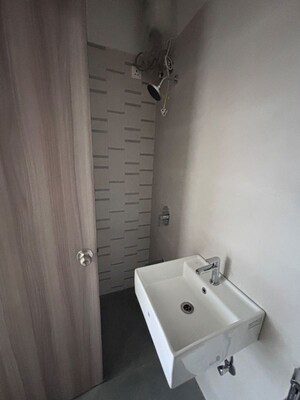Bathroom in 1 BHK Apartment at Ashar Arize, Kalwa – for Sale
