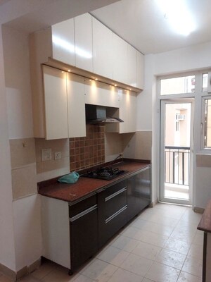 Kitchen in 2 BHK Apartment at Ajnara Gen X, Dundahera – for Sale