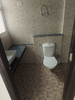 Bathroom in 3 BHK Apartment at Shri Radha Aqua Garden, Sector 16b Greater Noida – for Rent