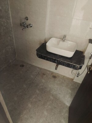 Bathroom in 3 BHK Apartment at Shri Radha Aqua Garden, Sector 16b Greater Noida – for Rent