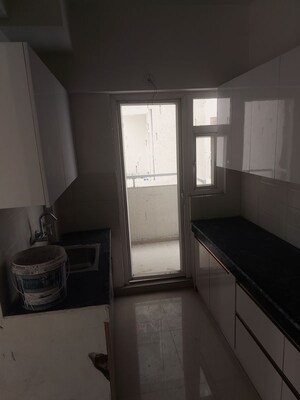 Kitchen in 3 BHK Apartment at Shri Radha Aqua Garden, Sector 16b Greater Noida – for Rent