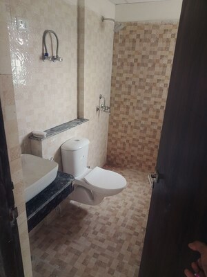 Bathroom in 3 BHK Apartment at Shri Radha Aqua Garden, Sector 16b Greater Noida – for Rent