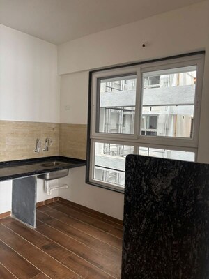 Kitchen in 2 BHK Apartment at Unique K Town, Kiwale – for Rent