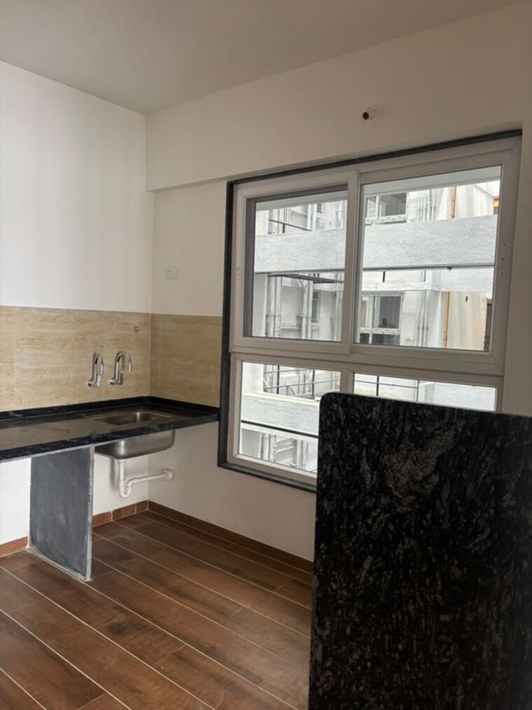 Kitchen, unique-k-town 2 Bedroom 840 Sq.Ft. Apartment In Kiwale Pune 10709557