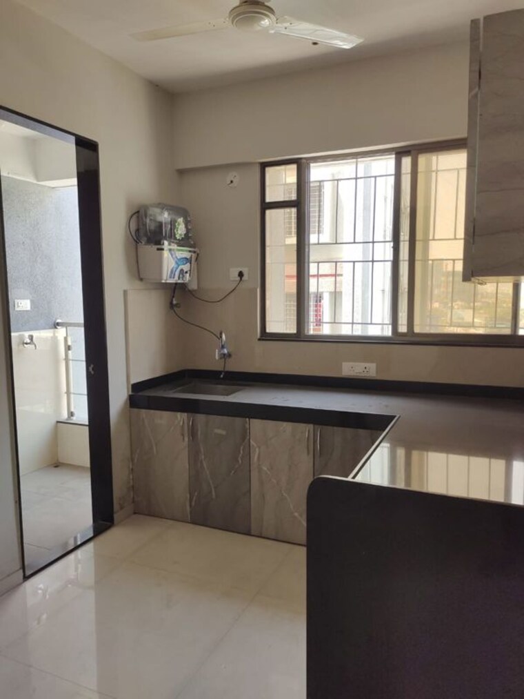 Kitchen, futuristic-the-spectrum 2 Bedroom 750 Sq.Ft. Apartment In Tathawade Pune 10709790