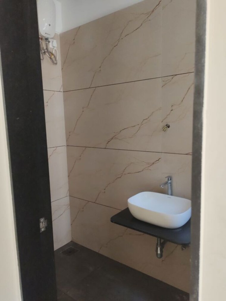 Bathroom, futuristic-the-spectrum 2 Bedroom 750 Sq.Ft. Apartment In Tathawade Pune 10709790