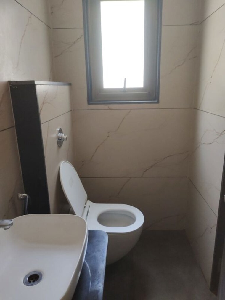 Bathroom, futuristic-the-spectrum 2 Bedroom 750 Sq.Ft. Apartment In Tathawade Pune 10709790