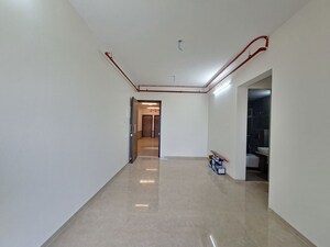 Living Room in 2 BHK Apartment at Dosti Tulip, Balkum Pada – for Sale