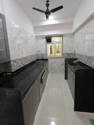 Kitchen in 2 BHK Apartment at DGS Sheetal Tapovan, Malad East – for Rent