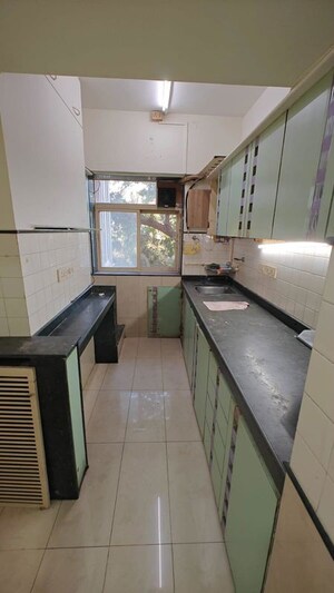 Kitchen in 2 BHK Apartment at Byculla – for Sale