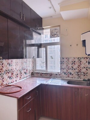 Kitchen in 2 BHK Apartment at Amrapali Leisure Park, Amrapali Leisure Valley – for Rent