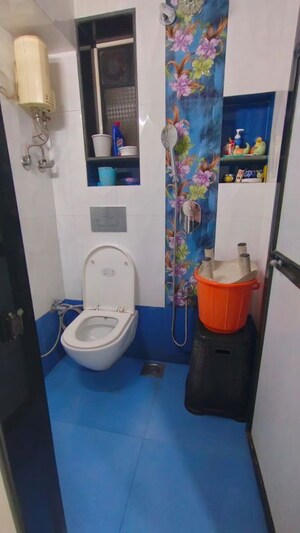 Bathroom in 3 BHK Apartment at Riddhi Gardens CHS, Malad East – for Rent