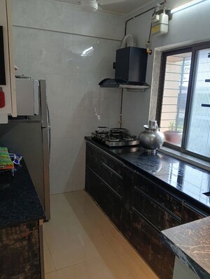 Kitchen in 2.5 BHK Apartment at Twins Marvel, Kharghar Sector 12 – for Sale