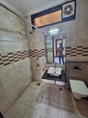 Bathroom in 3 BHK Builder Floor at Sushant Lok I – for Rent