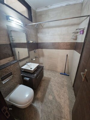 Bathroom in 3 BHK Builder Floor at Sushant Lok I – for Rent