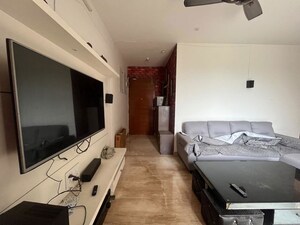 Living Room in 2 BHK Apartment at Marvel Fria, Wagholi – for Rent