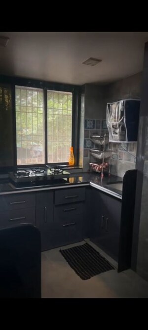 Kitchen in 2 BHK Apartment at Shree Gajanan Maharaj Nagar CHS, Kalyan West – for Sale