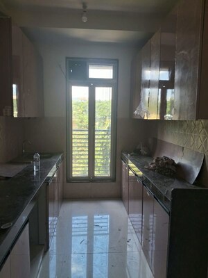 Kitchen in 3 BHK Apartment at Sheth Vasant Lawns, Laxmi Nagar – for Rent