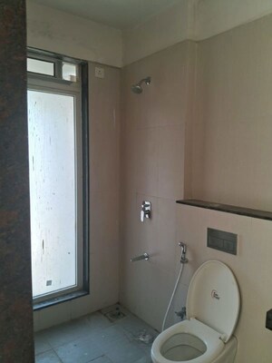 Bathroom in 3 BHK Apartment at Sheth Vasant Lawns, Laxmi Nagar – for Rent