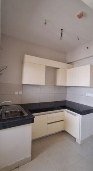 Kitchen in 2 BHK Apartment at Tata Eureka Park, Sector 150 – for Sale
