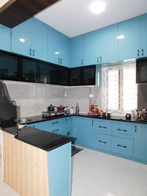 Kitchen in 2 BHK Apartment at Rudhra Bhuvi, Pragathi Nagar – for Sale