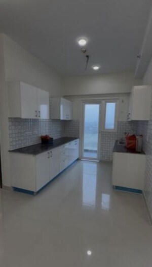 Kitchen in 2 BHK Apartment at Samridhi Luxuriya Avenue, Sector 150 – for Sale