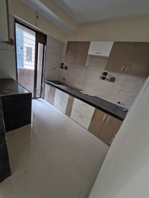 Kitchen in 2 BHK Apartment at Sri Dutt Garden Avenue K, Virar West – for Sale