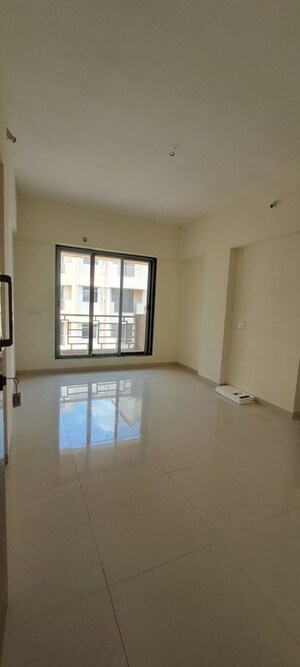 Room in 2 BHK Apartment at Pranjee Garden City, Katrap – for Rent