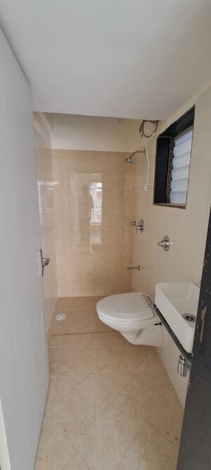 Bathroom in 2 BHK Apartment at Pranjee Garden City, Katrap – for Rent