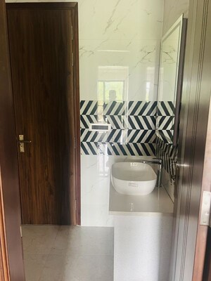 Bathroom in 4 BHK Builder Floor at Sector 23 – for Rent