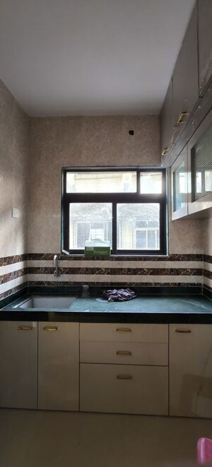 Kitchen in 1 BHK Apartment at Lodha Kolshet, Kolshet Road – for Sale