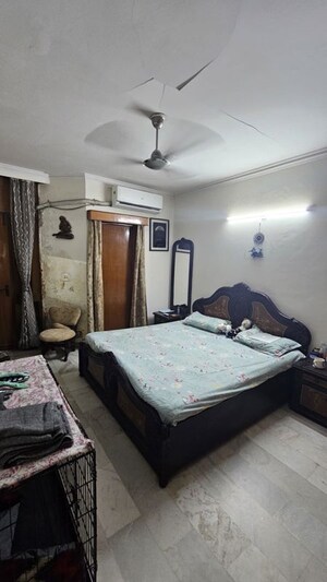 Bedroom in 3 BHK Builder Floor at Chittaranjan Park – for Sale