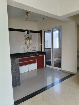 Room in 2 BHK Apartment at Mittal Petals, Wakad – for Rent