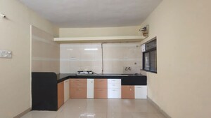 Kitchen in 2 BHK Apartment at Arun Sheth Sanskriti, Wakad – for Rent