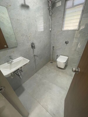 Bathroom in 3 BHK Apartment at Andheri CHS, Andheri West – for Rent